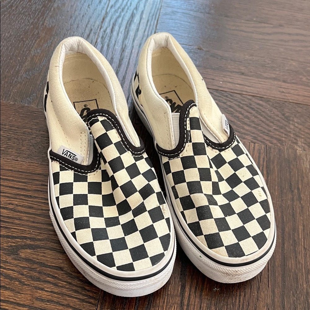 Vans Classic Checkerboard Slip-Ons in Black and White